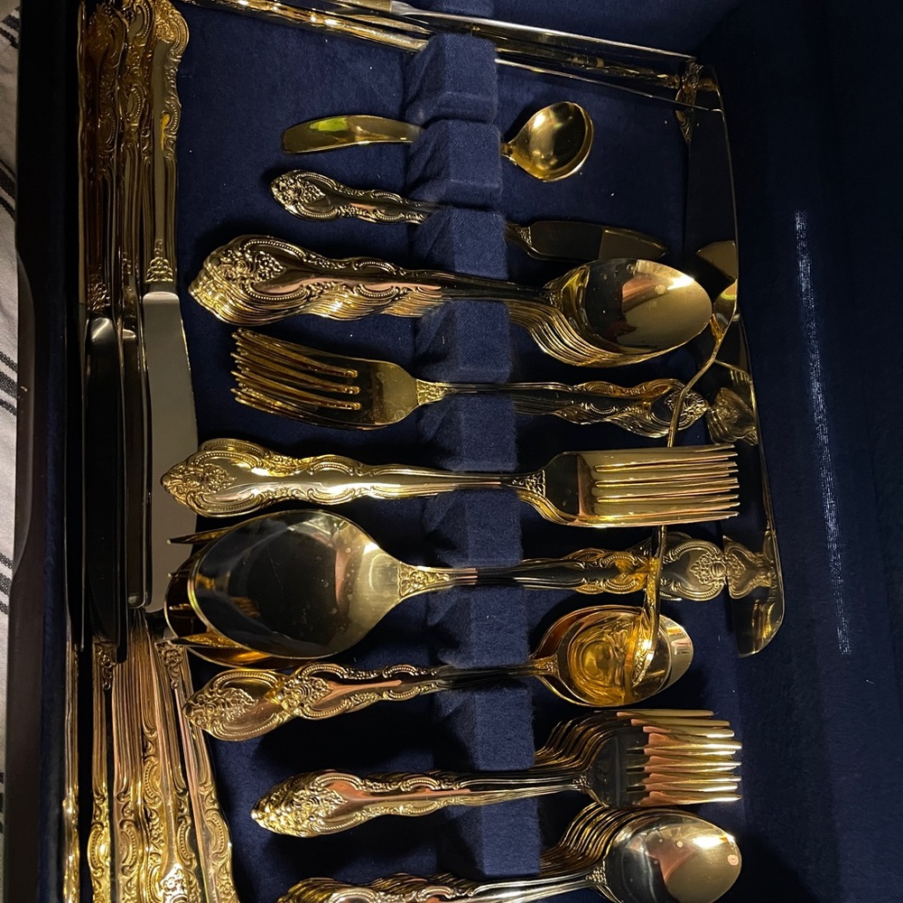 71 pieces International Gold flatware set in the original non-tarnish box